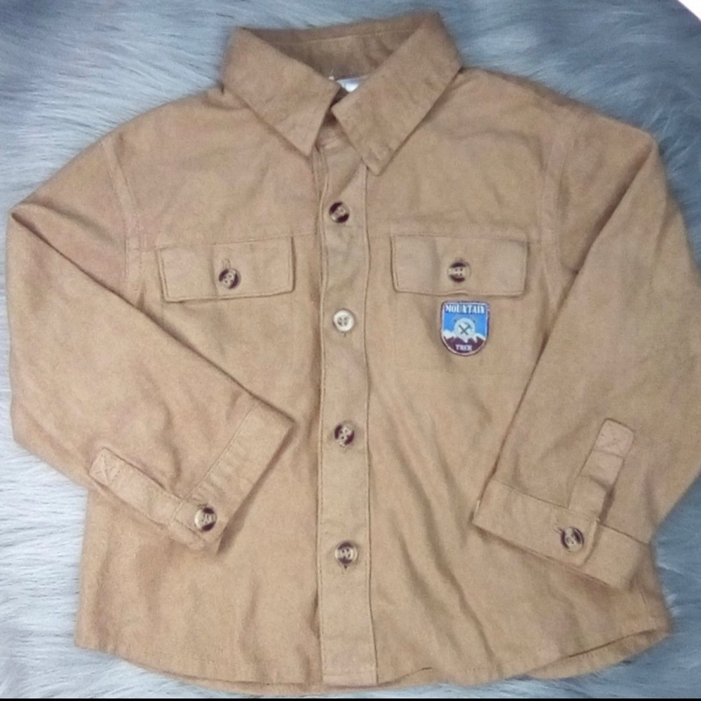 B.T. kidsvLong Sleeve shirt, 24months material is fuzzy on the outside.